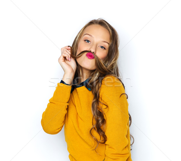 Stock photo: happy young woman or teen girl in casual clothes