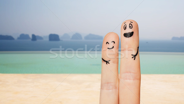 close up of two fingers with smiley faces Stock photo © dolgachov