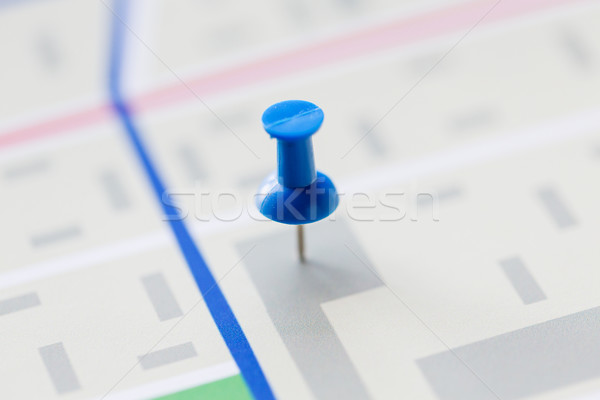 close up of map or city plan with pin Stock photo © dolgachov