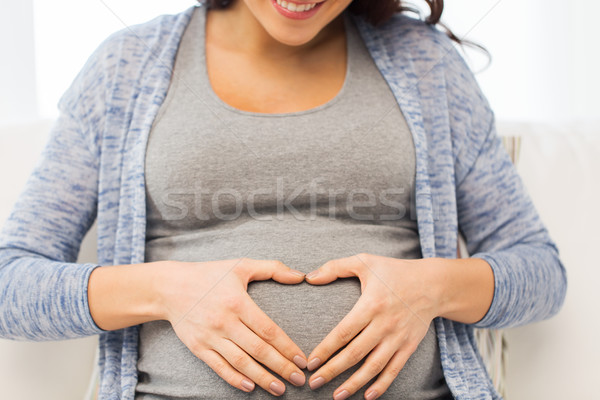 Stok fotoğraf: Mutlu · hamile · kadın · kalp · gebelik