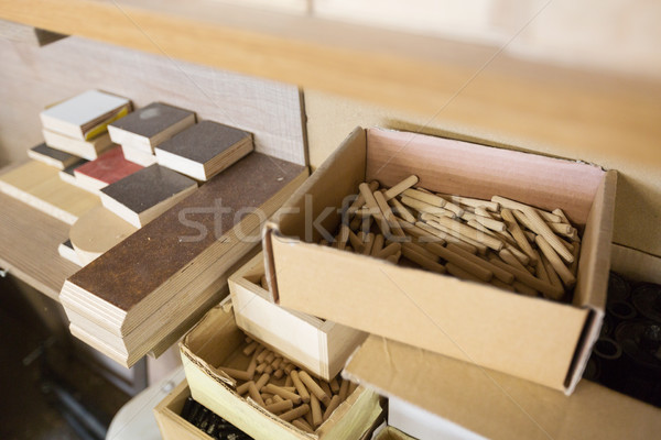 wood dowel pins and board samples at workshop Stock photo © dolgachov