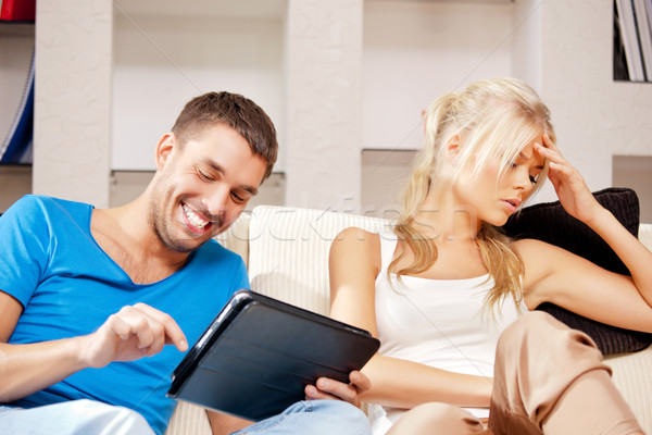 couple with tablet PC Stock photo © dolgachov