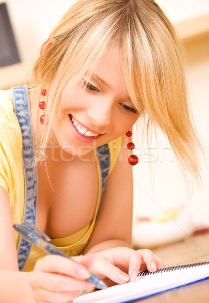 Genç kız defter kalem resim kadın kâğıt Stok fotoğraf © dolgachov
