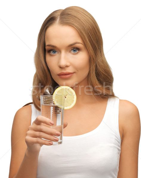 Stock foto: Frau · Zitronenscheibe · Glas · Wasser · Bild · glücklich