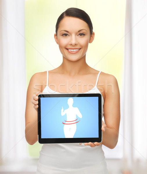 woman holding tablet pc with dieting application Stock photo © dolgachov