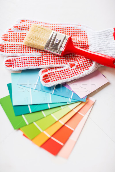 paintbrush, gloves and pantone samplers Stock photo © dolgachov