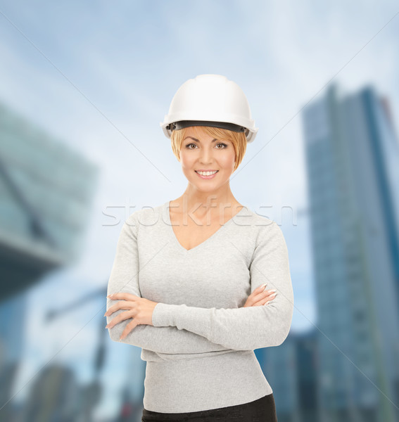 Feminino capacete edifício em desenvolvimento arquitetura Foto stock © dolgachov