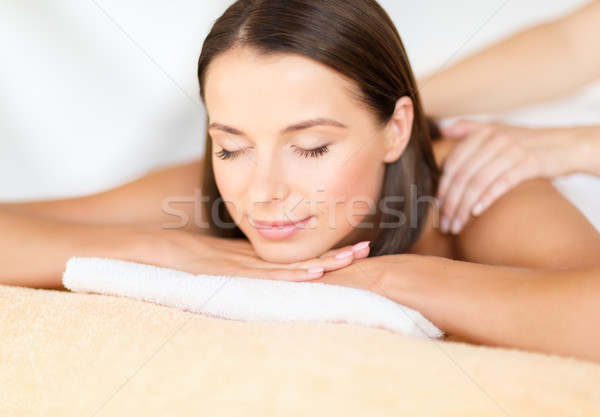 beautiful woman in spa salon getting massage Stock photo © dolgachov