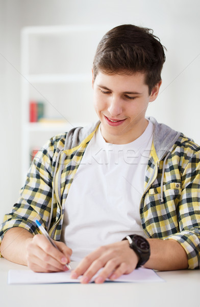 Stockfoto: Glimlachend · student · school · onderwijs · leerboek