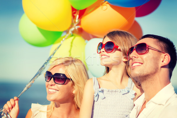 Stock foto: Glückliche · Familie · farbenreich · Ballons · Freien · Sommer · Feiertage