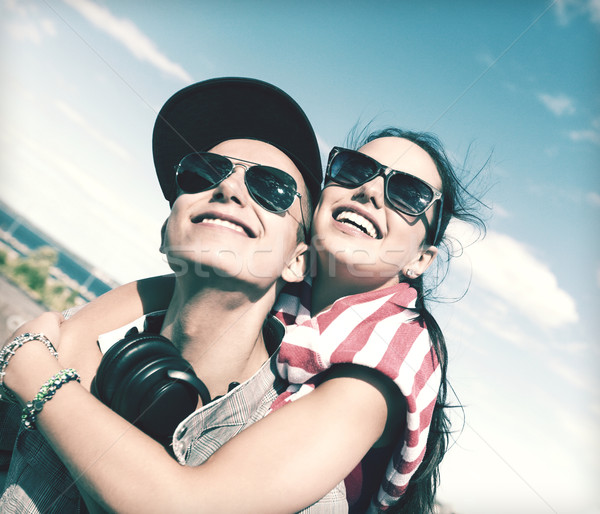 teenagers having fun outside Stock photo © dolgachov