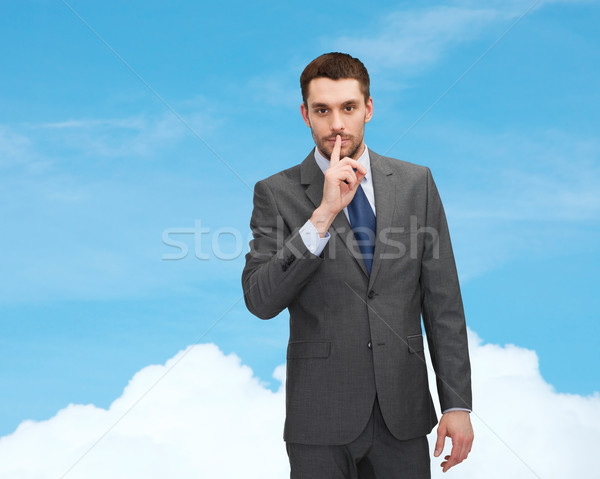 young businessman making hush sign Stock photo © dolgachov