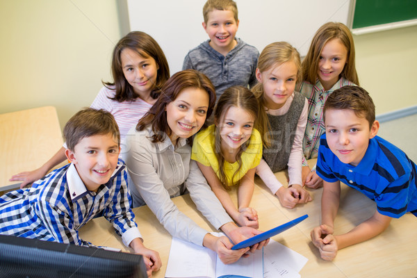 Groep kinderen leraar school onderwijs Stockfoto © dolgachov