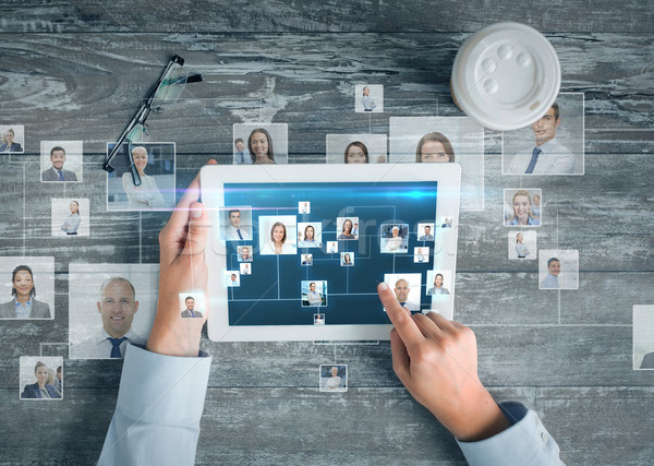 close up of hands with tablet pc and network Stock photo © dolgachov
