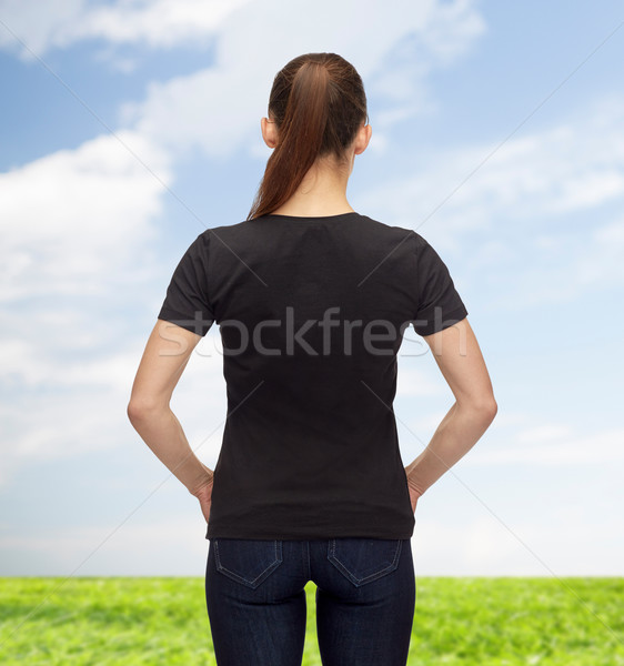 woman in blank black t-shirt Stock photo © dolgachov