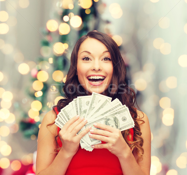 [[stock_photo]]: Femme · robe · rouge · dollar · argent · Noël · vente