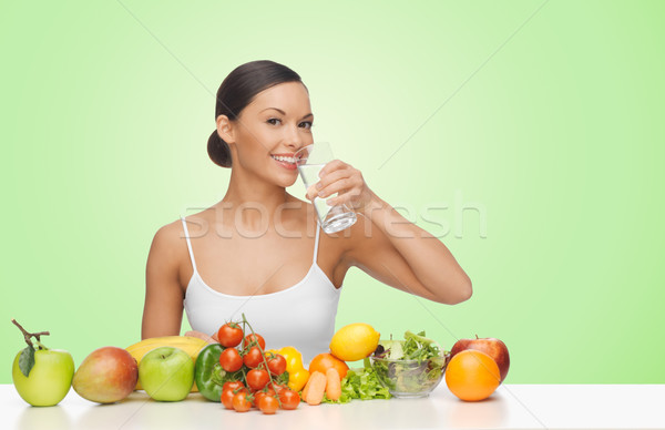Donna frutti verdura acqua potabile persone alimentare Foto d'archivio © dolgachov
