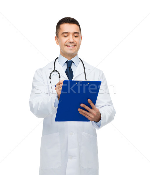 微笑 男醫生 剪貼板 聽筒 醫藥 行業 商業照片 © dolgachov