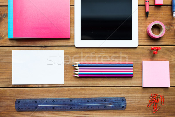 close up of school supplies and tablet pc Stock photo © dolgachov