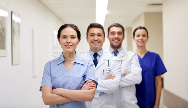 Groupe heureux médecins hôpital clinique profession [[stock_photo]] © dolgachov