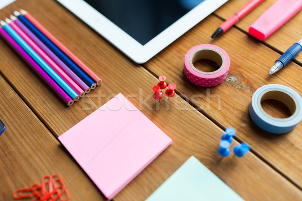 close up of school supplies and tablet pc Stock photo © dolgachov