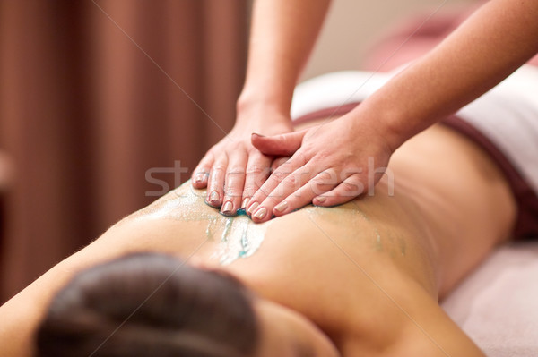Vrouw Maakt een reservekopie massage gel spa mensen Stockfoto © dolgachov