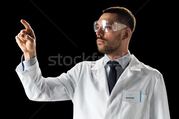 Arzt Wissenschaftler Laborkittel Schutzbrille Medizin Wissenschaft Stock foto © dolgachov
