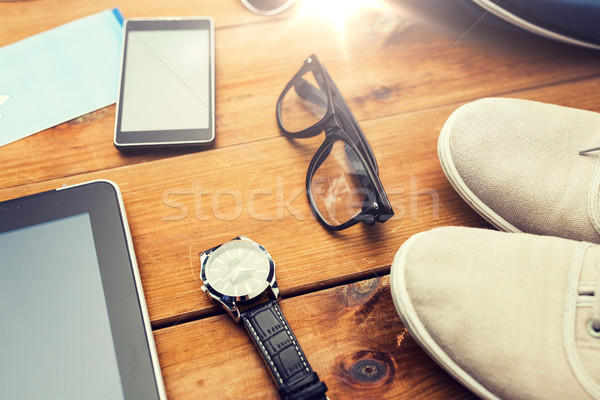 close up of gadgets and traveler personal stuff Stock photo © dolgachov