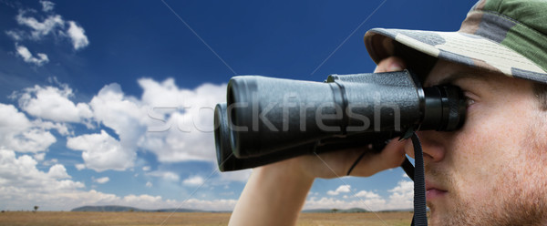 close up of soldier face looking to binocular Stock photo © dolgachov