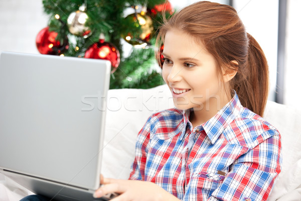 happy woman with laptop computer and christmas tree Stock photo © dolgachov