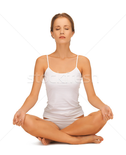 woman in undrewear practicing yoga lotus pose Stock photo © dolgachov
