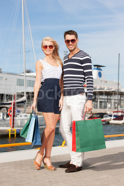 young couple in duty free shop Stock photo © dolgachov