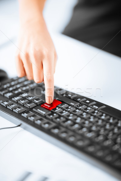 hand pressing success button on keyboard Stock photo © dolgachov
