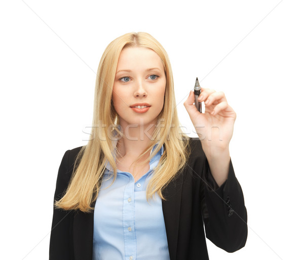 businesswoman writing something in the air Stock photo © dolgachov