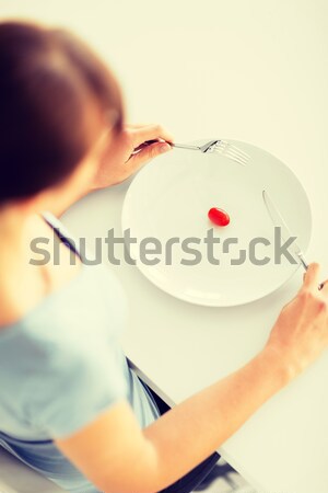 Nő tányér egy paradicsom sport egészségügy Stock fotó © dolgachov
