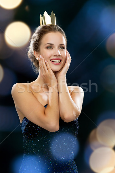Mosolygó nő estélyi ruha visel korona emberek ünnepek Stock fotó © dolgachov