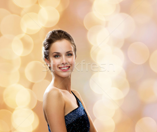 Сток-фото: улыбающаяся · женщина · вечернее · платье · люди · зима · праздников · Рождества