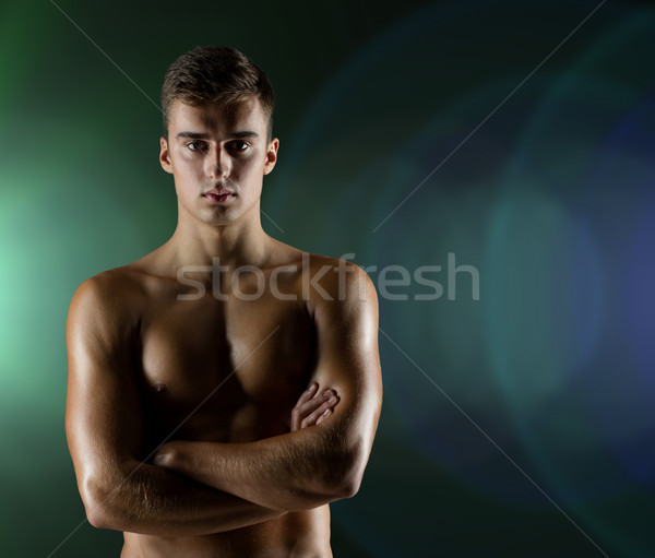 Młodych mężczyzna kulturysta muskularny tułowia Zdjęcia stock © dolgachov