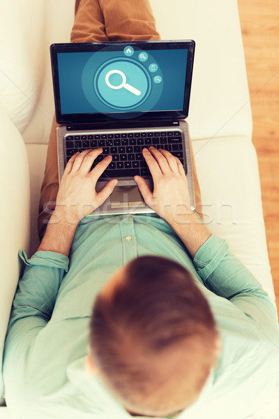 Człowiek pracy laptop domu technologii Zdjęcia stock © dolgachov