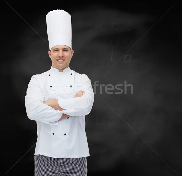 happy male chef cook with crossed hands Stock photo © dolgachov