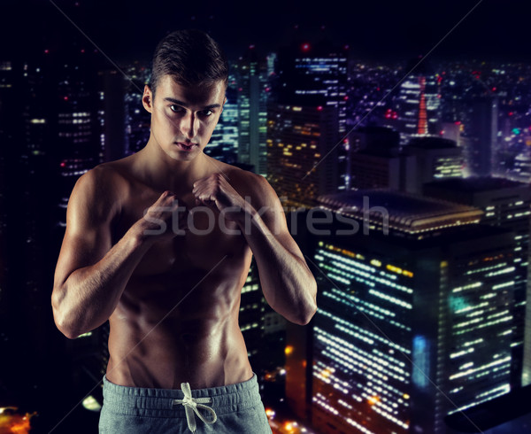 Młody człowiek boks pozycja sportu konkurencja Zdjęcia stock © dolgachov