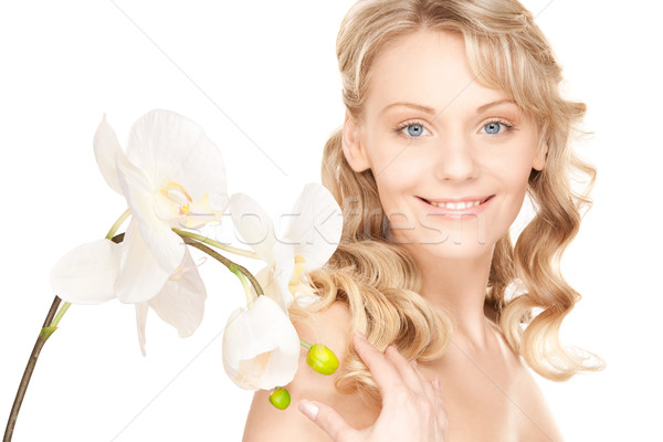 beautiful woman with white flower Stock photo © dolgachov