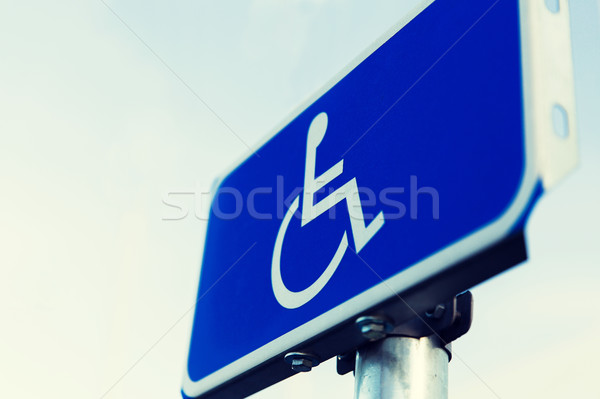 close up of road sign for disabled outdoors Stock photo © dolgachov