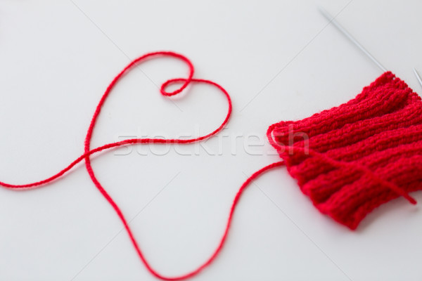 knitting needles and thread in heart shape Stock photo © dolgachov