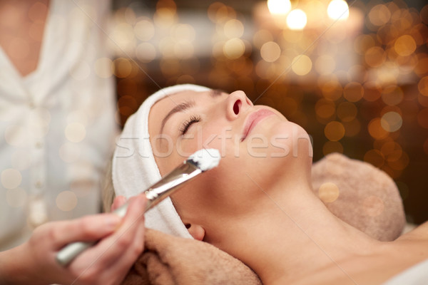 close up of young woman and cosmetologist in spa Stock photo © dolgachov