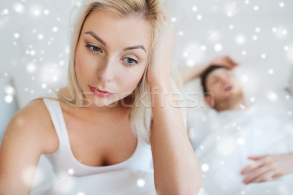 awake woman having insomnia in bed Stock photo © dolgachov