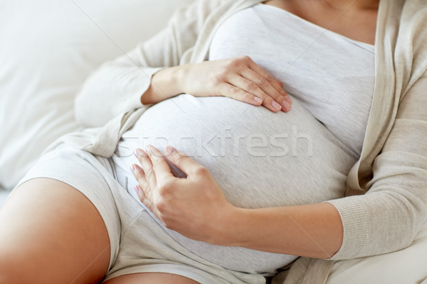 Femme enceinte lit maison grossesse personnes [[stock_photo]] © dolgachov