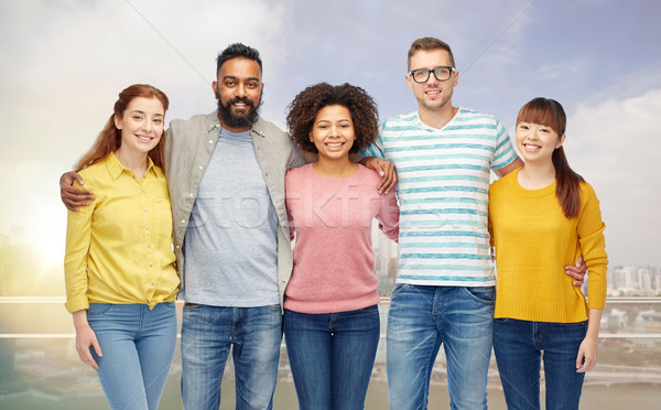 international group of happy smiling people Stock photo © dolgachov