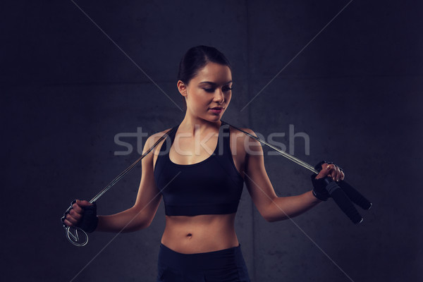 young sporty woman with jumping rope Stock photo © dolgachov