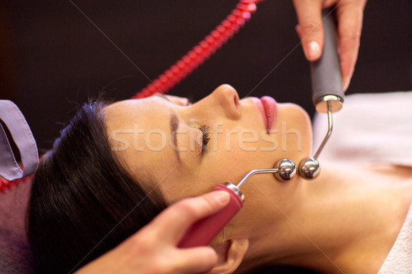 Stock photo: woman having hydradermie facial treatment in spa